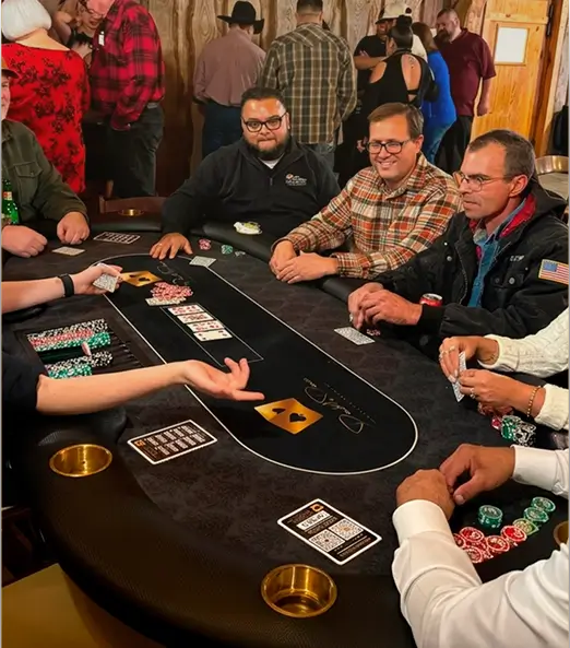 Dealer guiding guests through a casino game